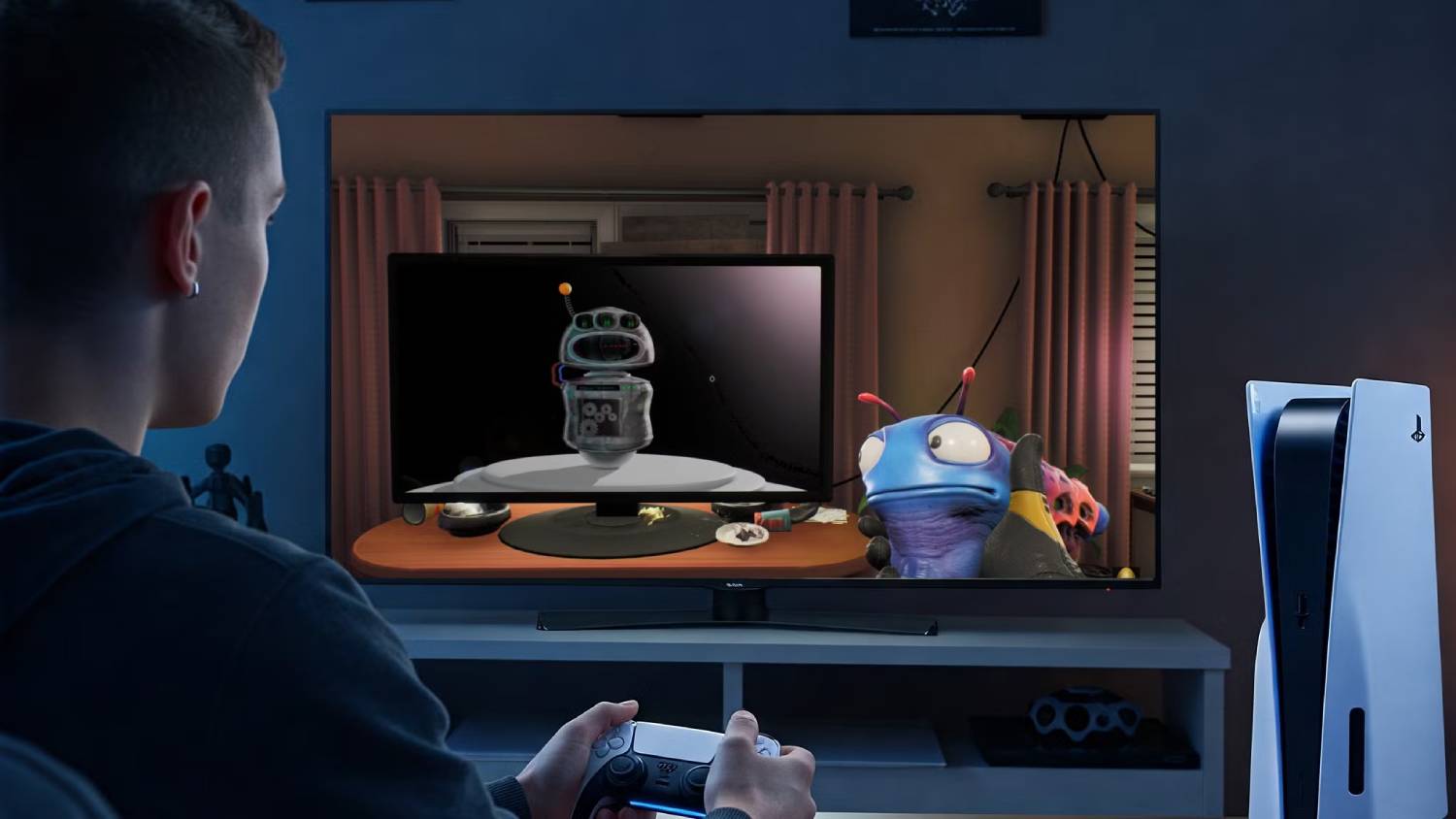 A person sits holding a game controller, focused on a TV displaying a cartoon robot and colorful characters in a cozy gaming setup.