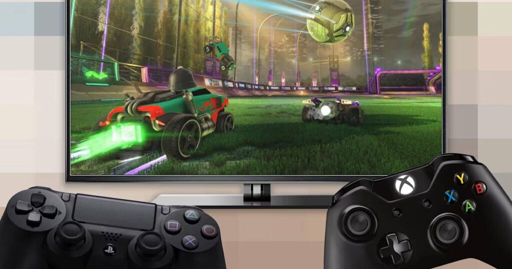 A TV displays a Rocket League match with vibrant cars and a soccer ball, alongside a PlayStation and Xbox controller in foreground.